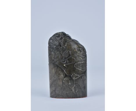 A Chinese Soapstone Seal carved with dragon amongst clouds over mountains. Three character seal to base. In fitted silk box. 