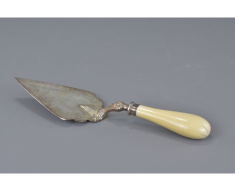 An Antique Victorian presentation trowel with ivory handle. 17cm length