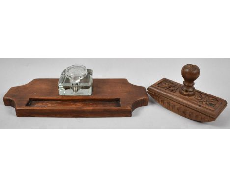A Mid 20th Century Carved Wooden Desktop Blotter Together with a Wooden Pen Rest Inkstand with Glass Inkwell, 29cm Wide 