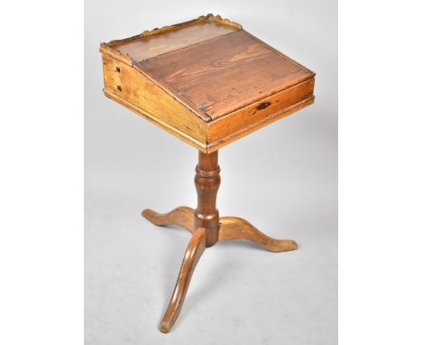 A 19th Century Elm Writing Slope with Galleried Top and Side Pen Drawer Having Hinged Lid to Fitted Interior on Turned Tripod