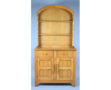 A Mid 20th Century Dresser with Domed Top and Two Shelf Plate Rack, Two Centre Drawers and Base Cupboard, 89cm Wide 