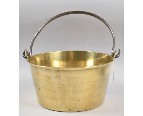 A Vintage Brass Jam Kettle with Steel Loop Handle, 29cm diameter 