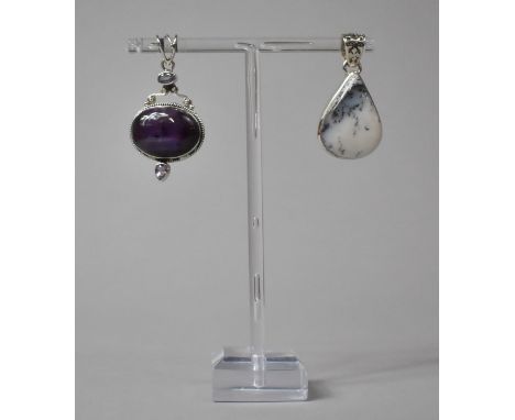 An Amethyst Cabochon Oval Pendant Together with a Moss Agate Example in Silver Frame 