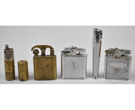 A Collection of Five Vintage Pocket Lighters to Include a Brass Trench Art Example (We are Unable to Post Lighters) 