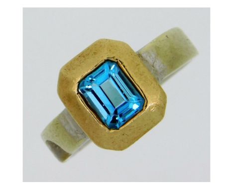 An art deco style 9ct two colour gold ring set with topaz, 3.9g, size M/N