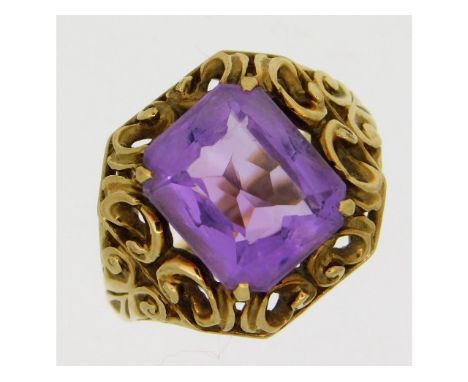 A 9ct gold gypsy style ring with carved decor set with amethyst, stone 12mm x 10mm, 5.84g, size O/P