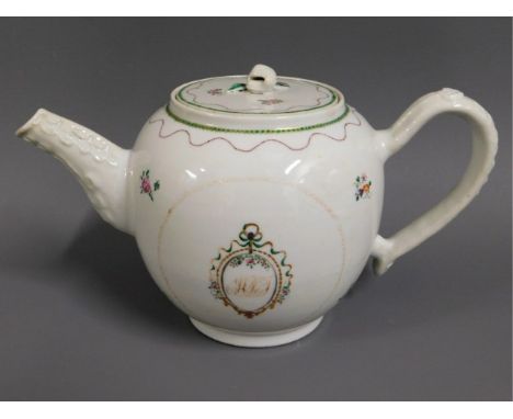 An early 19thC. Chinese porcelain teapot with monogrammed crest to side, 9in wide