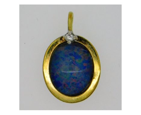 A 9ct gold pendant with opal doublet &amp; small diamond, 12.5mm x 10mm excluding loop, 0.8g