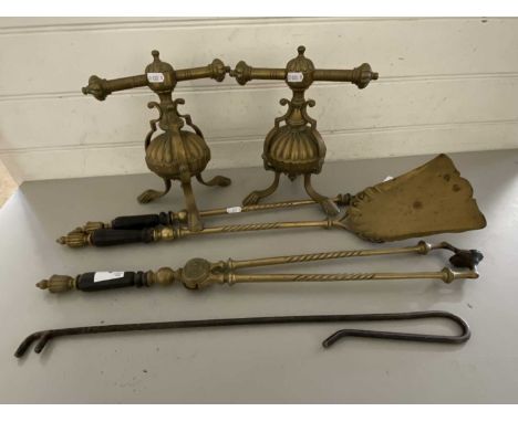 Pair of brass fire dogs together with brass fire tools