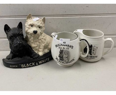 Mixed Lot: Buchanans black and white Scotch Whisky advertising items comprising two jugs and a composition door stop (3)