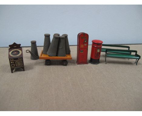 A Quantity of 1930's Hornby 'O' Gauge Station Accessories, including pillar box, seats, churns and barrow.