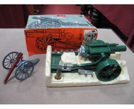 A 1960's Britains 18" Howitzer, with cartridge and five shells, overall fair/good in poor box, plus another Britains cannon, 