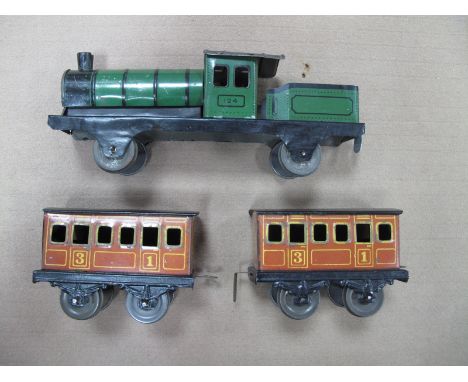 A Pre War Tinplate Brimtoy Floor Train and Two Coaches. 