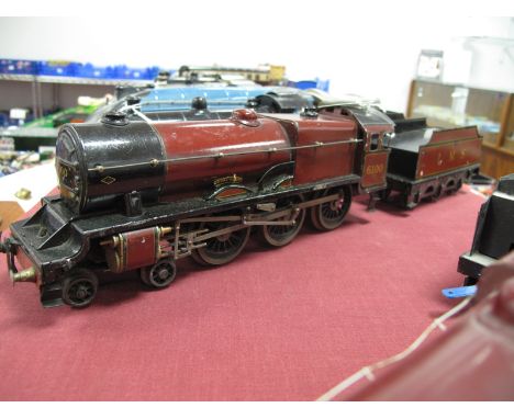 A 1930's 'O' Gauge 4-6-0 'Royal Scot' Three Rail Electric  by Bassett Lowke, with six wheel tender, finished in LMS maroon, R