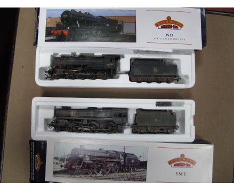 Two Bachmann "OO" Gauge/4mm Steam Locomotives and Tenders, both boxed and weathered to a very good standard. Ref 32-257 WD 2-