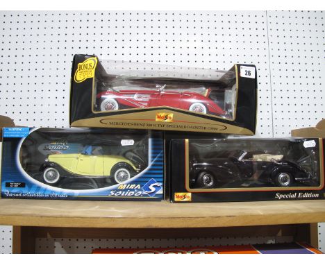 Three 1:18th Scale Diecast Model Cars, by Maisto, Solido including Maisto Mercedes Benz 300S, Mercedes-Benz 500K Typ Special 