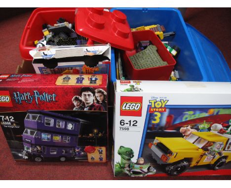 A Collection of Lego, which includes components from The Lego #4866 Harry Potter Knight Bus and #7598 Toy Story three sets, b