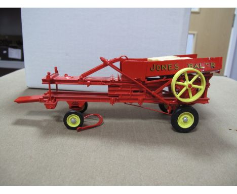 A Boxed G and M Originals Diecast Model Agriculture Jones Bailer, some damage.