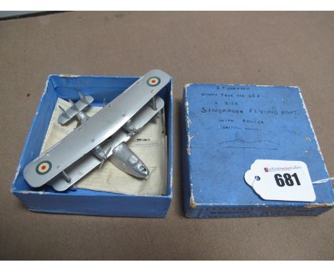 A 1930's Dinky No 60h 'Singapore Flying Boat' In Silver, some signs of fatigue, boxed with gliding leaflet, rubbing and pen t