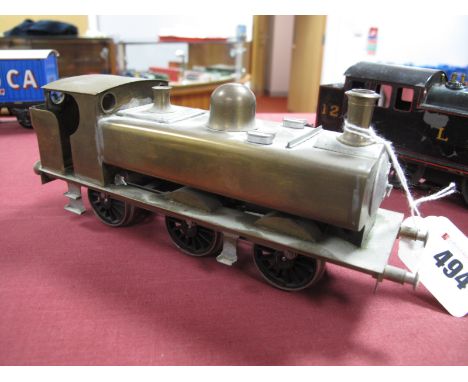 An "O" Gauge/7mm Brass 0-6-0 Pannier Tank Locomotive, electric two rail, unpainted.