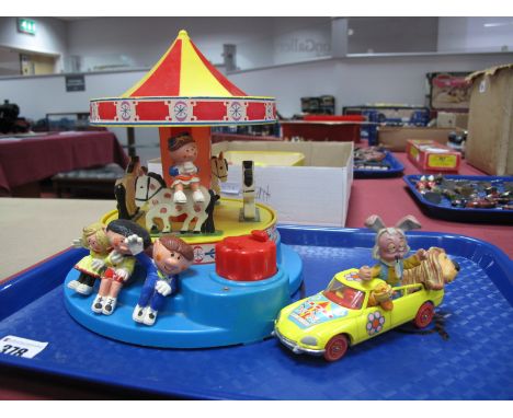 A Corgi Magic Roundabout, with four figures and a Corgi 'Dylan' car, playworn.