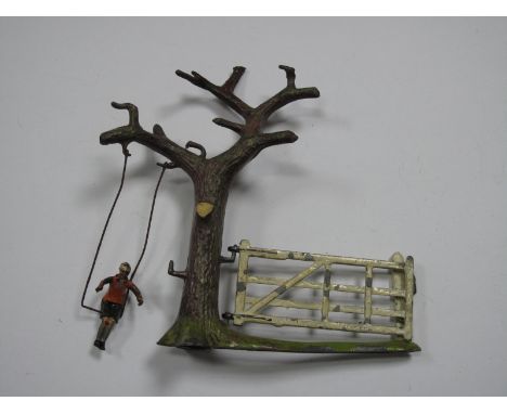 Pre-War Britains Lead Garden No. 19, tree and gate with boy on swing, missing swing seat.