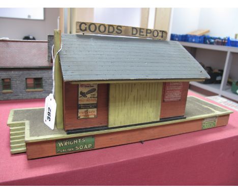 A 1930's 'O' Gauge Wooden 'Goods Depot' for Bassett Lowke, with original tin signs.