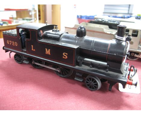 An "O" Gauge/7mm 2-4-2 Three Rail Electric Locomotive, finished to a high standard in LMS black, R/no 672 and signed L Goddar