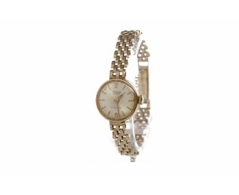 LADY'S RONE INCABLOC NINE CARAT GOLD MANUAL WIND WRIST WATCHthe round dial with applied gold coloured Arabic numerals and bat