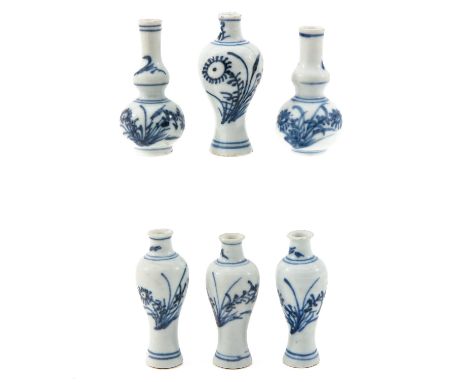 Blue and white decors, Kangxi Period, tallest vase is 6 cm., chip.