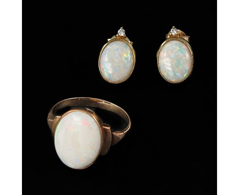 Largest opal is 10 x 13 mm. ring size 17.