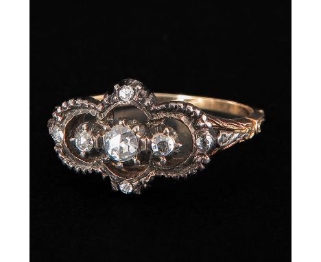 Set with rose cut diamonds silver over gold ring size 17.