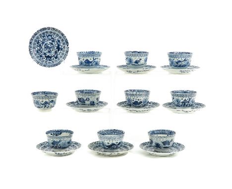 Decorated with sea creatures, Kangxi Mark and Period, saucers are 13 cm. in diameter, chip and hairline.