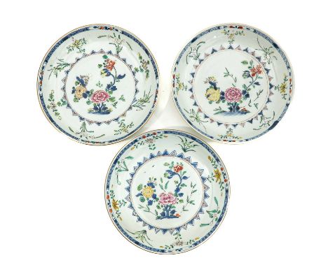 Depicting scene in garden with flowers, Kangxi Period, 22 cm. in diameter, chip and hairline. 