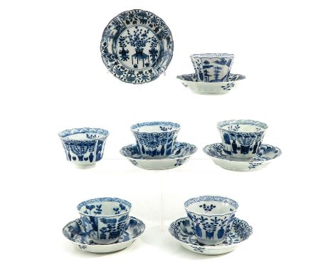 Including 6 cups and 6 saucers, decorated with flowers and Chinese antiquities, saucers are 13 cm. in diameter, chip and hair