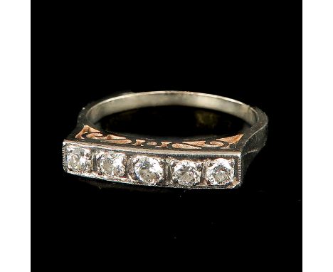 Set with 5 diamonds ring size 17.