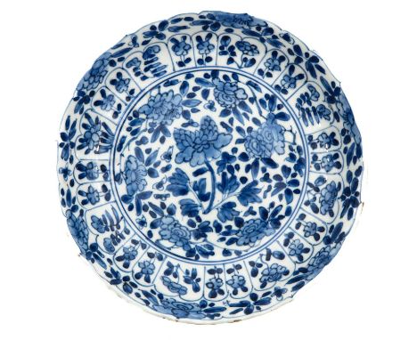 Floral decor, Kangxi Mark and Period, 21 cm. in diameter, chip and hairline.
