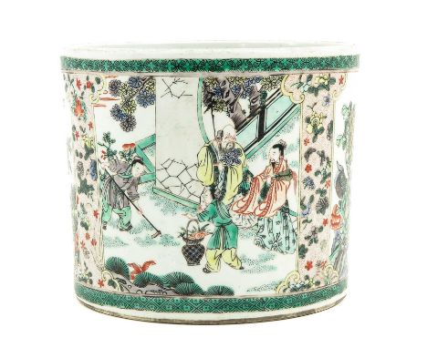 Decorated with 4 panels of Chinese figures and birds and flowers, 18 cm. tall x 22 cm. in diameter, Kangxi mark, hairline.