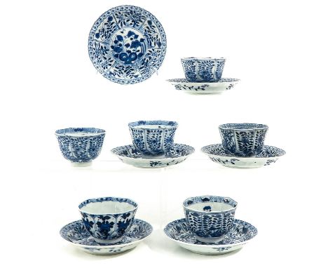 6 cups and 6 saucers, floral decor, largest saucer is 14 cm. in diameter, chip.