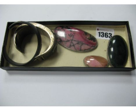 An Oval Hardstone Inset Panel Brooch, cabochon set, with rope twist border, a further two similar, together with a hardstone 