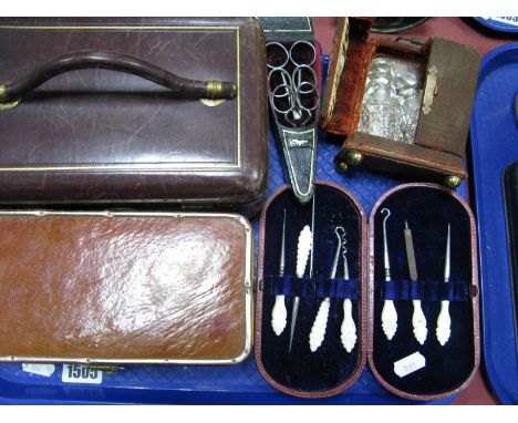 Three Pairs of Scissors in Edwardian Black Morocco Case, pair of hobnail glass scent bottles in XIX Century red plush cases, 