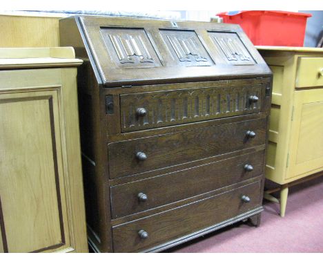 XX Century Bureau File, the fall front with linen fold decoration, fitted interior, top drawer with knulled decoration, over 
