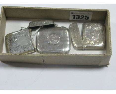 Three Hallmarked Silver Vesta Cases, engine turned and leaf scroll engraved, two initialled. (3)