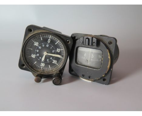 A British Armed Forces Aeroplane Clock by Camerer Cuss and compass