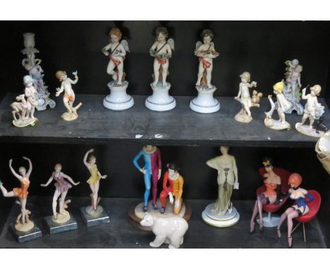 TWO SHELVES OF VARIOUS CONTINENTAL STYLE CERAMIC FIGURES 