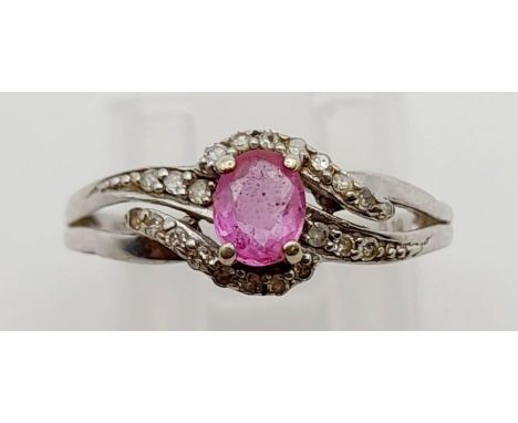 A 9K White Gold Pink Sapphire and Diamond Cluster Ring. 0.10ct. Size K 1/2. 1.7g 