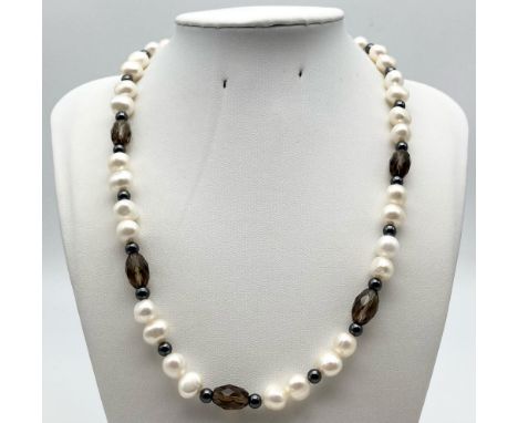 A 925 Silver Freshwater Pearl and Hematite Necklace.9mm pearl beads. 44cm 