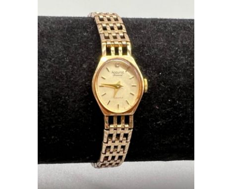 A Vintage Accurist 9K Gold Ladies Watch. Gold strap and case - 15mm. 13.34g total weight. A/F. 