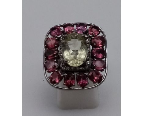 3.80cts Citrine centre stone set Ring with 5.50cts Rhodochrosite and 0.35cts Diamonds decorating in Pave Setting, size L 