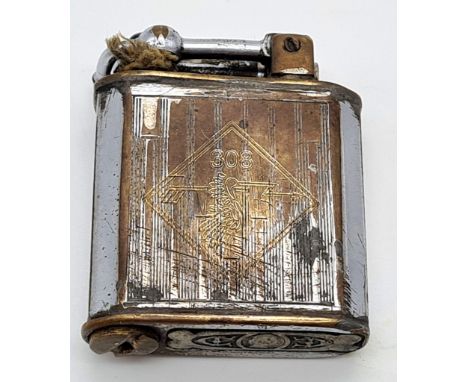 WW2 Polish Raf cigarette lighter. Dedicated to ?Jacub? of the 308 th Polish Fighter Sqn. The lighter is worn but can still ma